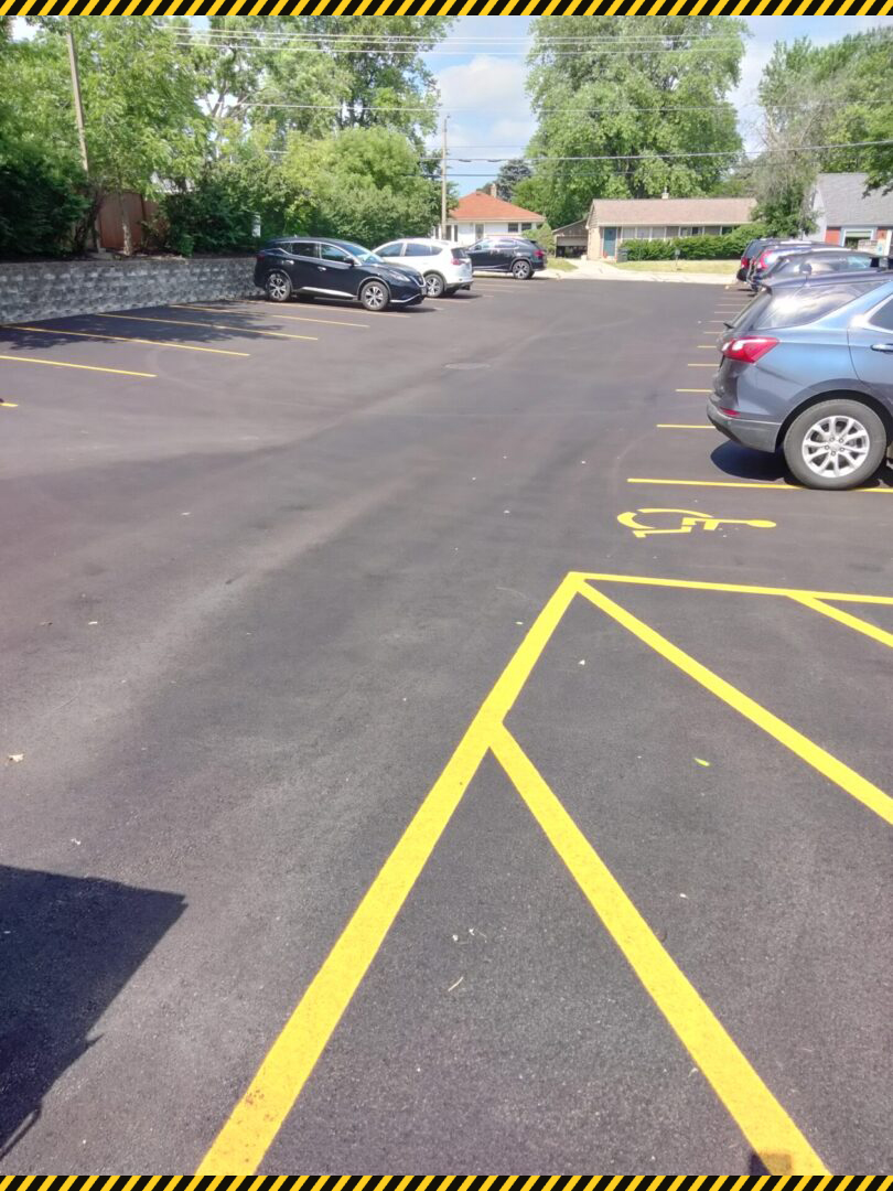 asphalt paved road as car parking